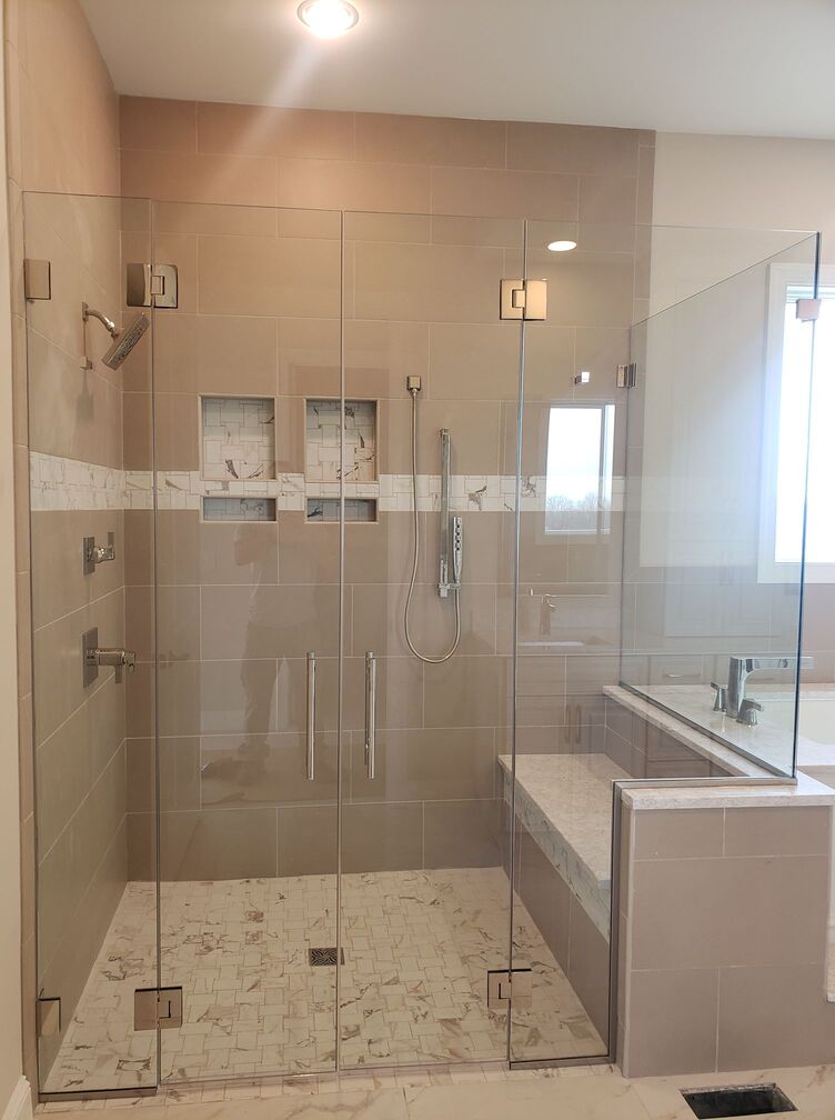 walk-in-shower-with-bench-and-frameless-glass